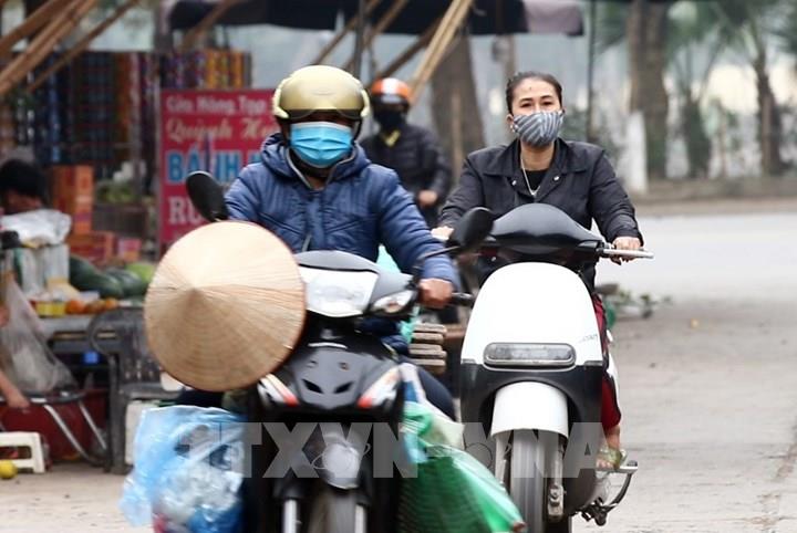 Người dân thực hiện nghiêm việc đeo khẩu trang nơi công cộng