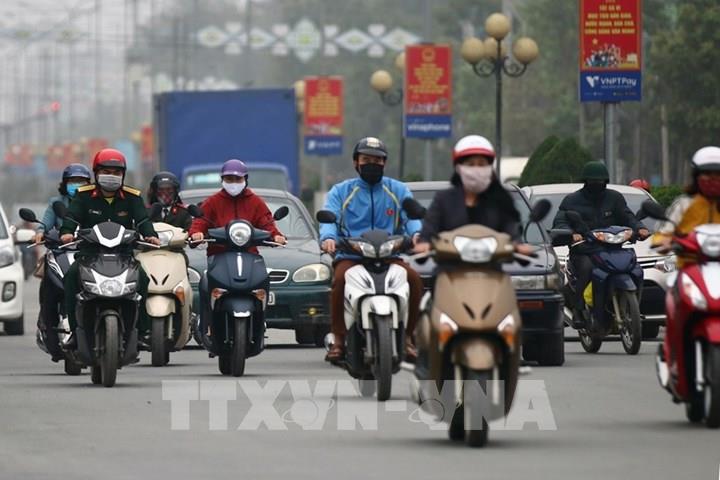 Người dân thực hiện nghiêm việc đeo khẩu trang nơi công cộng