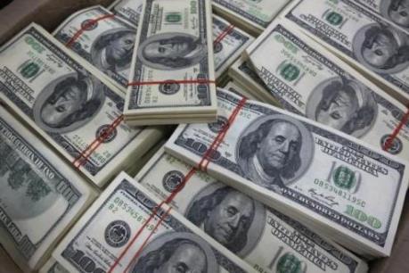 Đồng USD giảm giá trước kỳ họp đầu năm của Fed