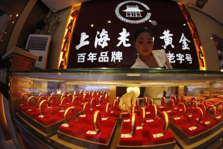 Vàng hạ giá sau quyết sách mới của Fed