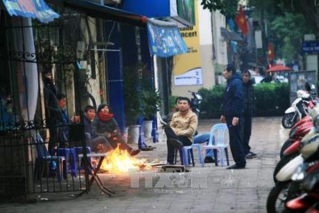 Cuộc sống của người dân Hà Nội đảo lộn vì giá rét
