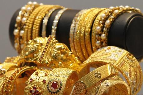 Giá vàng thế giới đi xuống phiên 14/3