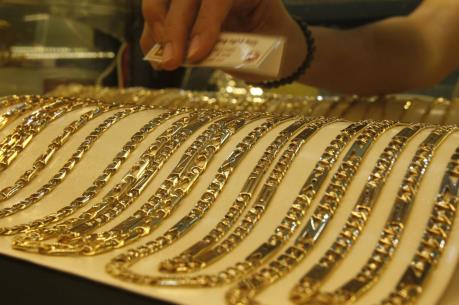 Giá vàng châu Á chiều 28/3 chạm "đáy" của một tháng