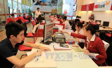 Ngân hàng tăng cường kiểm soát rủi ro bảo vệ khách hàng