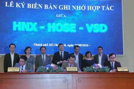 HOSE, HNX ký kết hợp tác với Trung tâm lưu ký chứng khoán Việt Nam