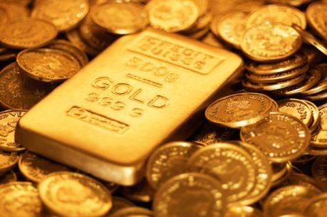 Giá vàng có thể giảm xuống 1.250 USD/ounce nếu bà Clinton thắng cử