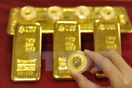 Giá vàng châu Á trượt dốc do đồng USD phục hồi
