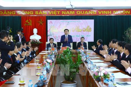Phó Thủ tướng Vương Đình Huệ thăm Ngân hàng Chính sách Xã hội