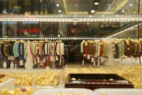 Giá vàng châu Á sụt giảm phiên thứ ba liên tiếp