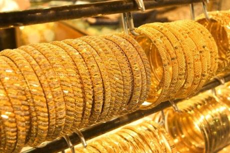 Giá vàng châu Á đi xuống sau hàm ý tăng lãi suất của Chủ tịch Fed