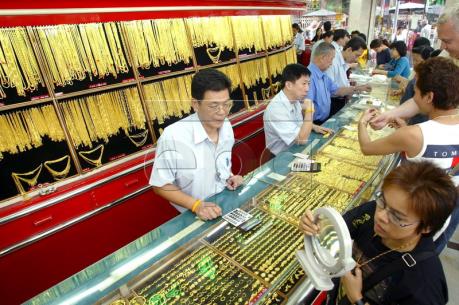 Giá vàng châu Á giao dịch trong biên độ hẹp trước cuộc gặp của hai nhà lãnh đạo Mỹ-Trung