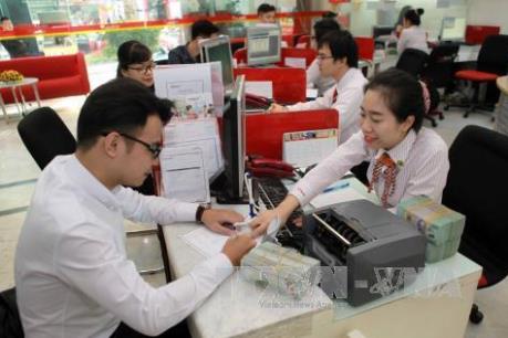 Lãi suất được kỳ vọng ổn định do áp lực tỷ giá giảm thiểu