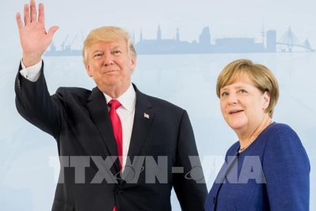 Cái bắt tay chủ động giữa lãnh đạo hai cường quốc kinh tế Đức-Mỹ