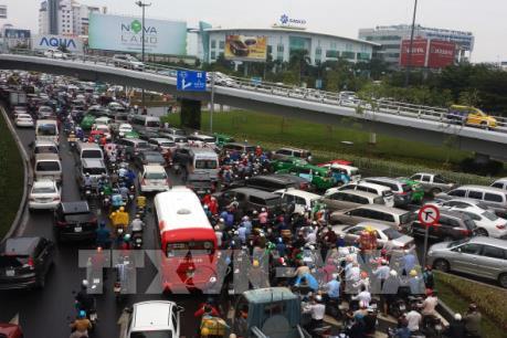 Tp. Hồ Chí Minh đề nghị tạm thời ngưng cung cấp phần mềm Uber, Grab kết nối thêm xe mới