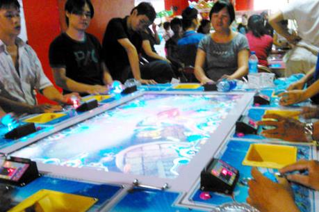 Cá cược ăn tiền "núp bóng" game bắn cá