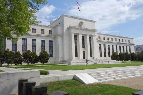 Fed giữ nguyên lãi suất và kết thúc chương trình kích thích kinh tế