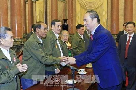 Chủ tịch nước Trần Đại Quang gặp mặt đại biểu công dân Lào có công với cách mạng Việt Nam