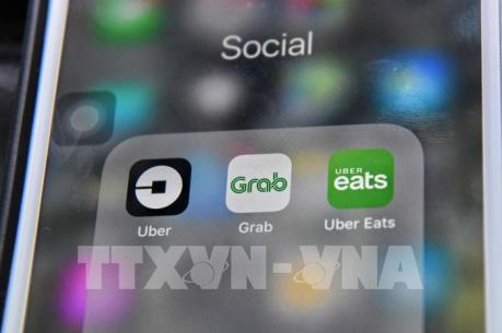 Vụ Grab thâu tóm Uber ở Đông Nam Á: Cạnh tranh sẽ giảm
