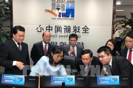 Đẩy mạnh hợp tác giữa Thông tấn xã Việt Nam và Tân Hoa xã