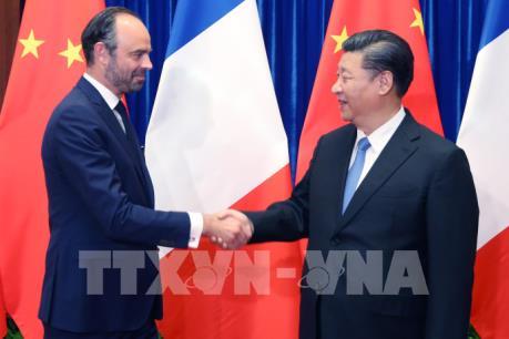 Trung Quốc, Pháp cam kết đối phó chính sách “Nước Mỹ trước tiên”