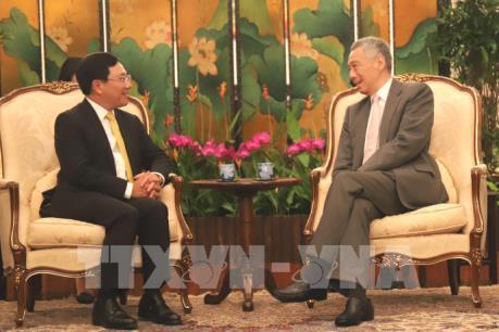 Phó Thủ tướng Phạm Bình Minh hội kiến với Tổng thống và Thủ tướng Singapore