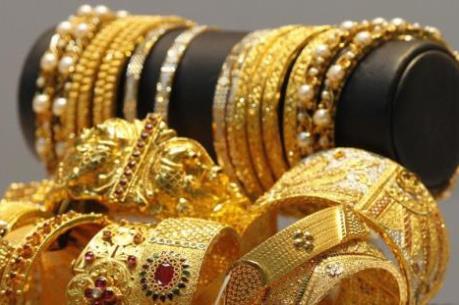 Giá vàng châu Á chạm mức thấp nhất trong 18 tháng