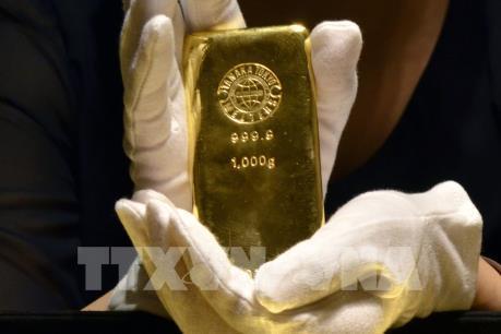 Giá vàng thế giới tiệm cận ngưỡng 1.200 USD/ounce