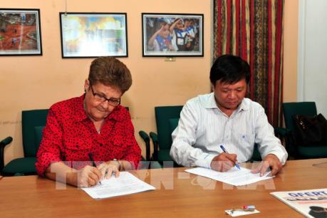 TTXVN hợp tác với các đối tác Cuba