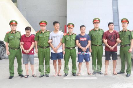 Công an Việt Nam bàn giao tội phạm truy nã cho Trung Quốc