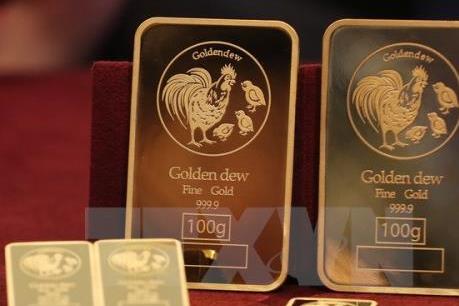 Vàng thế giới đi xuống sau 2 tuần lên giá liên tiếp