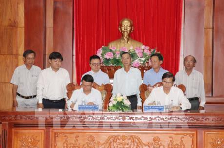 Hợp tác thông tin giữa TTXVN và UBND tỉnh Tiền Giang