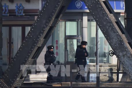 Dịch COVID-19: Cảnh sát Trung Quốc xử lý hàng trăm đối tượng trục lợi