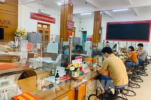 Dịch COVID-19: Agribank cùng doanh nghiệp vượt khó