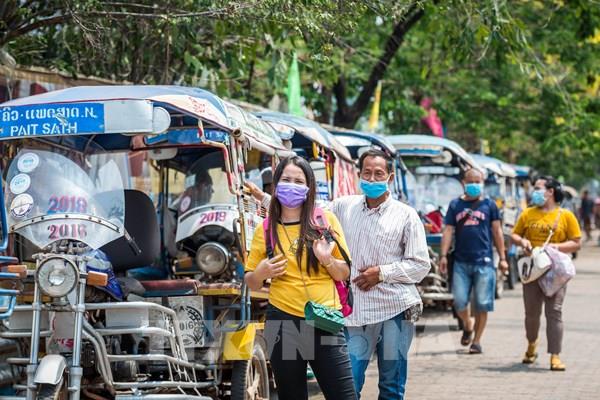 Người nước ngoài tại Lào tạm thời không phải xin gia hạn lưu trú nếu hết hạn thị thực