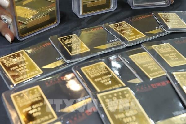 Giá vàng thế giới lập “đỉnh” trong chín năm