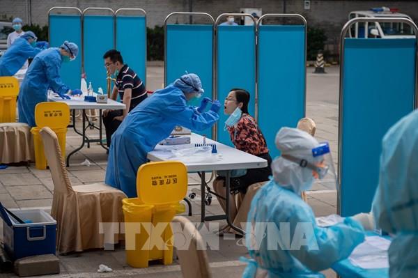 Trung Quốc kêu gọi ngăn chặn virus SARS-CoV-2 lây lan tại Bắc Kinh