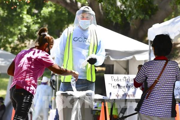 Số ca mắc mới COVID-19 tại Mỹ tăng mạnh nhất từ trước tới nay