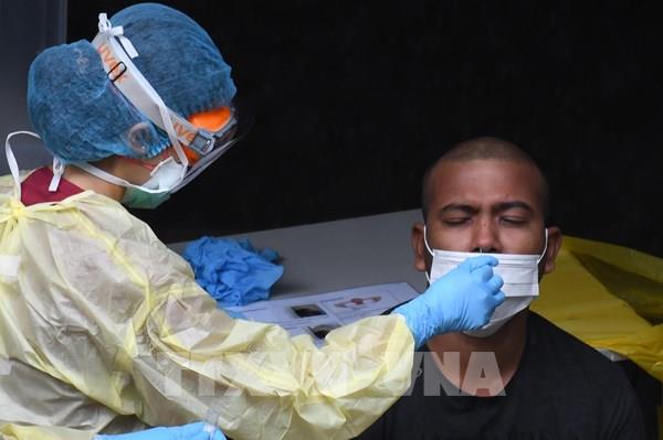 Singapore triển khai xét nghiệm cho lái xe taxi và người giao hàng