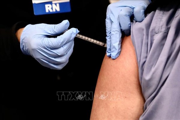 Mỹ: Nhiều bang yêu cầu đẩy nhanh tiến độ tiêm vaccine phòng COVID-19