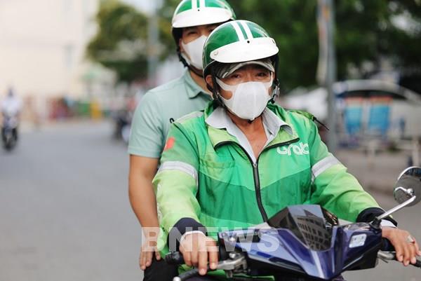 TP.HCM siết chặt phòng, chống dịch COVID-19 đối với xe công nghệ