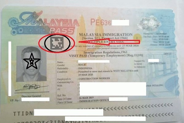 Malaysia triệt phá băng nhóm làm giả giấy phép nhập cảnh và làm việc