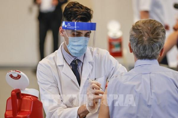 Mỹ đã tiêm chủng 228,66 triệu liều vaccine phòng COVID-19