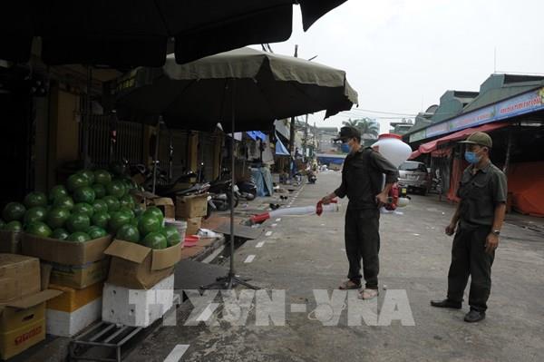 Nhiều biện pháp phòng, chống COVID-19 tại chợ đầu mối lớn nhất Thủ đô