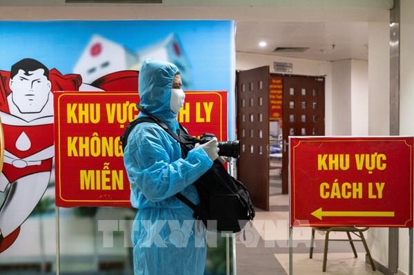 Phóng viên TTXVN xung kích trên mặt trận chống dịch COVID-19
