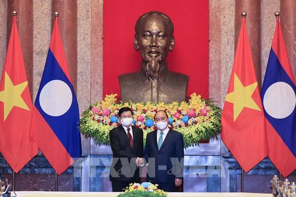 Chủ tịch nước Nguyễn Xuân Phúc hội kiến Tổng Bí thư, Chủ tịch nước Lào Thongloun Sisoulith