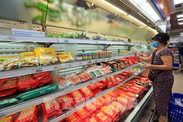 Doanh nghiệp, nhà bán lẻ giảm lãi để bình ổn thị trường