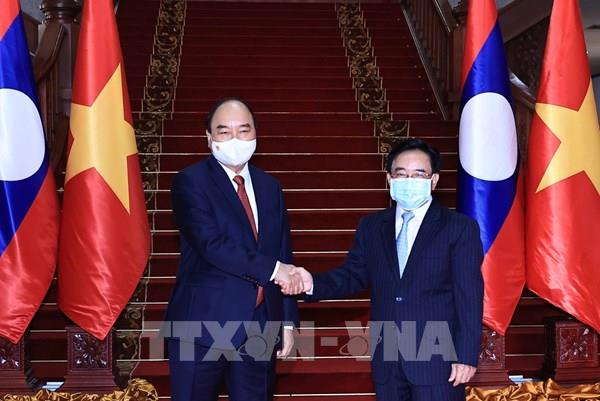 Chủ tịch nước Nguyễn Xuân Phúc hội kiến Thủ tướng Lào