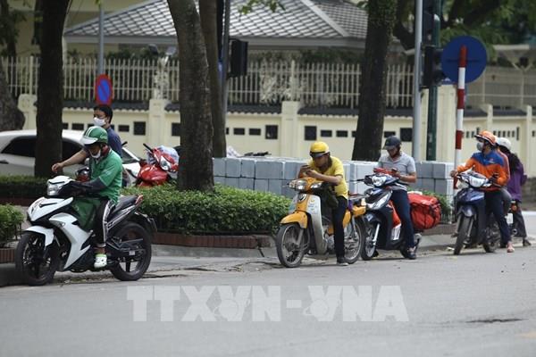 Hà Nội quản lý phòng dịch COVID-19 cho đội ngũ shipper như thế nào?
