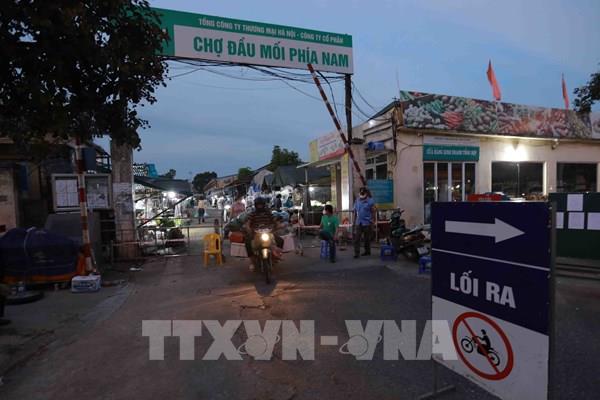 Xét nghiệm COVID-19 bằng test nhanh kháng nguyên hàng tuần cho người làm việc tại các chợ