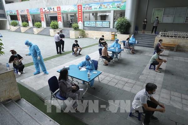 Đẩy nhanh công tác xét nghiệm, tiêm vaccine tại Hà Nội và TPHCM trước 15/9